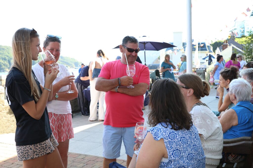 Guests socialising on the Cliff House terrace