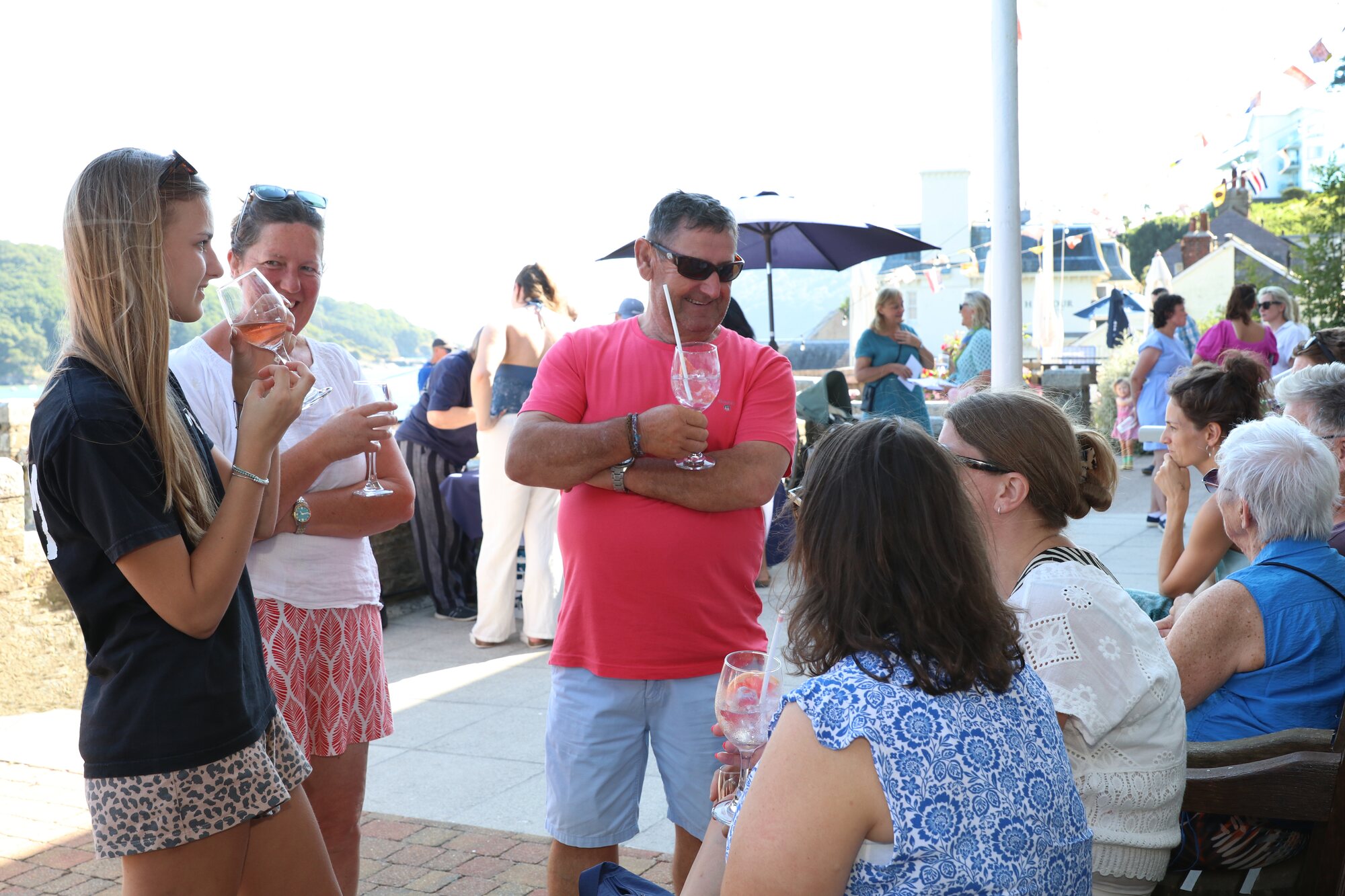 Guests socialising on the Cliff House terrace