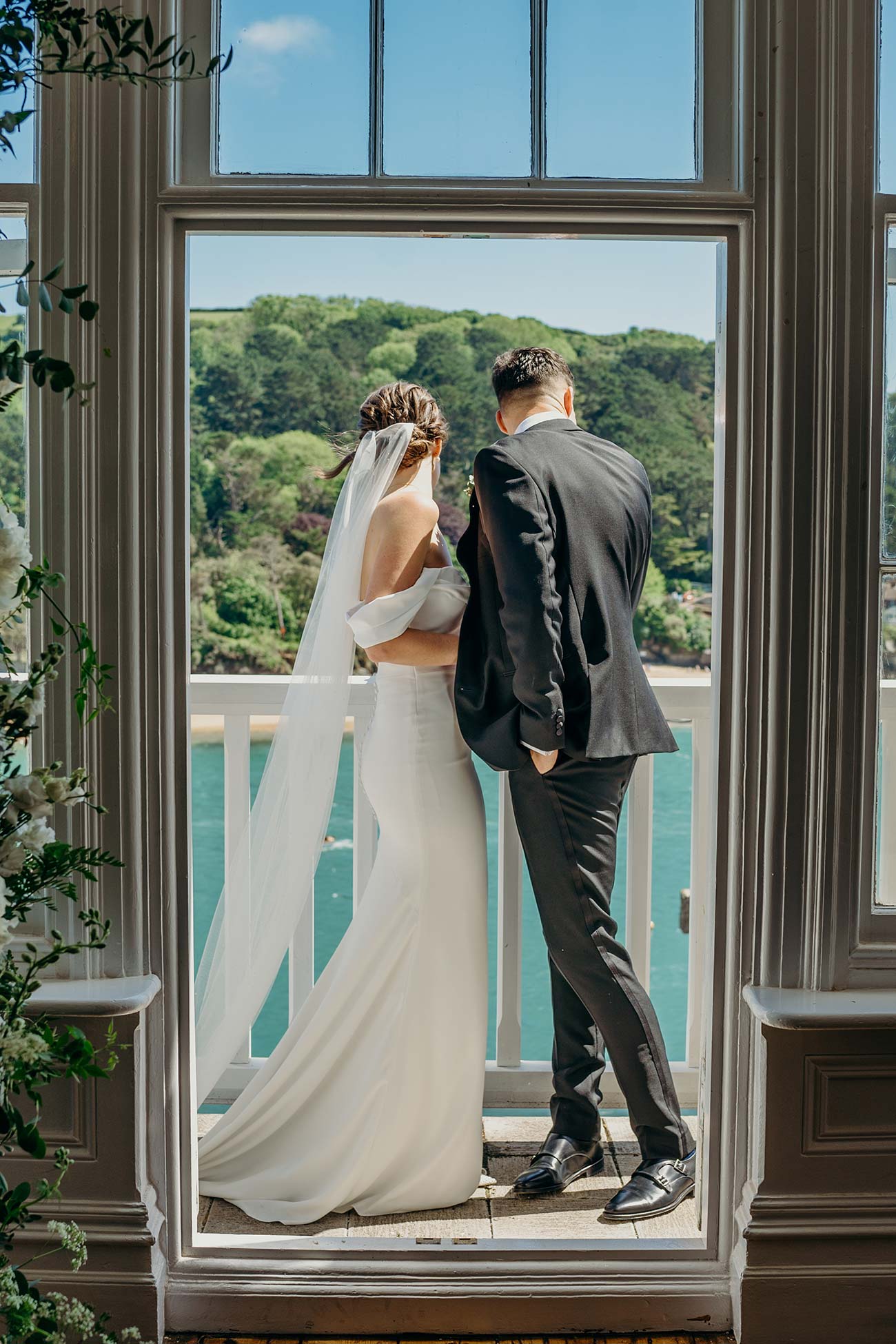 Wedding couple framed in the Cliff House doorway